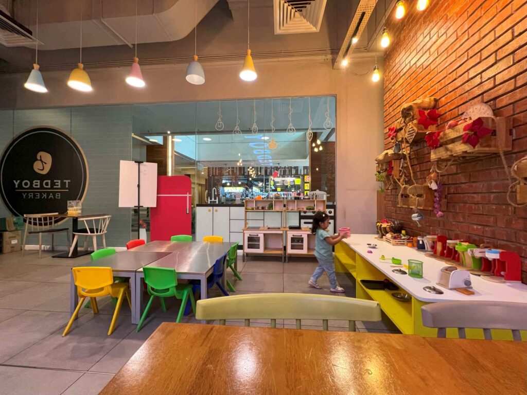 Toddler plays at Tedboy baby friendly cafe KL.