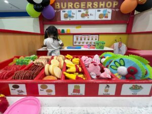 Toddler playing at indoor playground Kuala Lumpur.