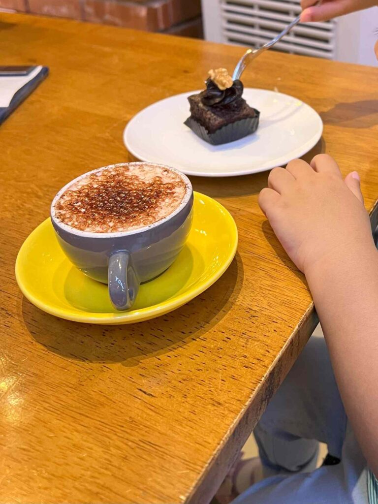 Babycino and brownie at Tedboy Bakery, one of the kid friendly restaurants in KL.