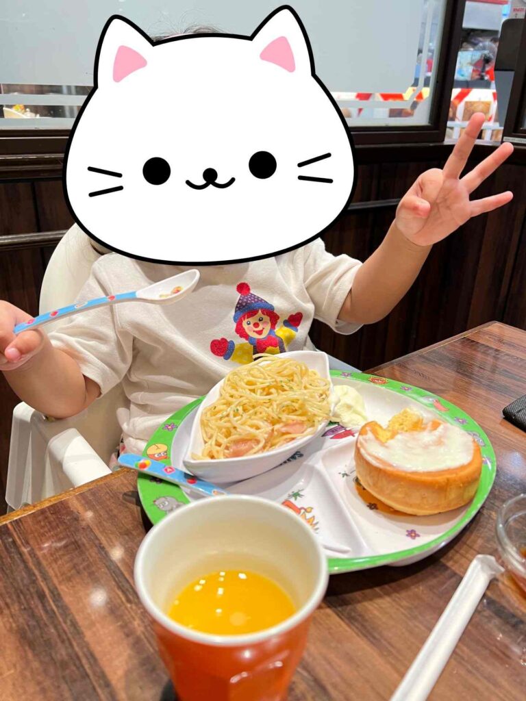 Toddler enjoying the kids' menu at Hoshino Coffee KL.